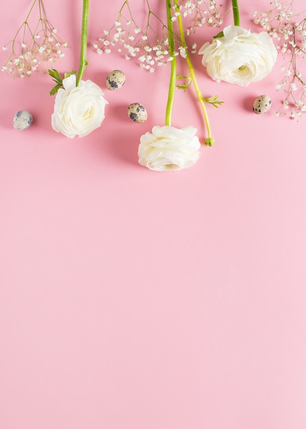 Pink happy easter flowers flat lay background  top view