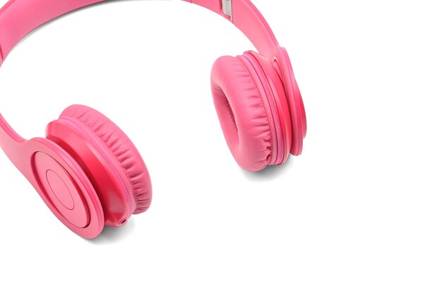 Pink headphones for listening to sound and music isolated