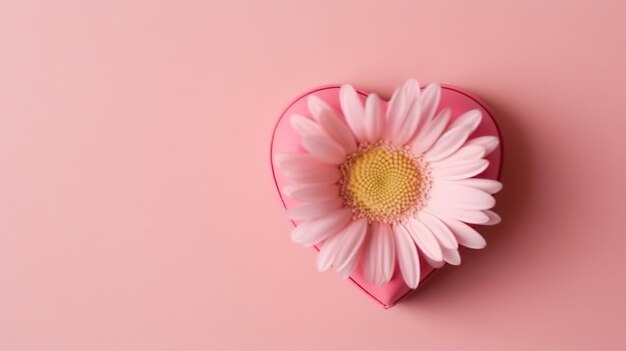 A pink heart with a daisy on it on a pink background.