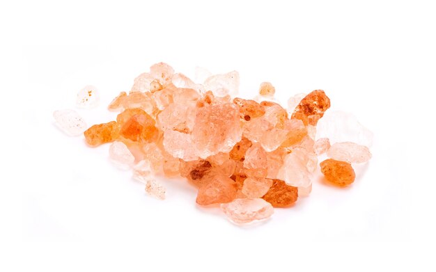 Pink Himalayan salt with stacking focusing isolated on white background