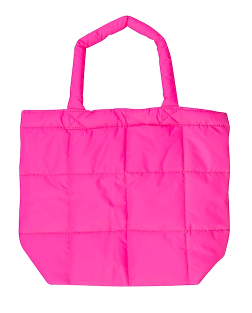白い背景に隔離されたピンクの革のファッションバッグ