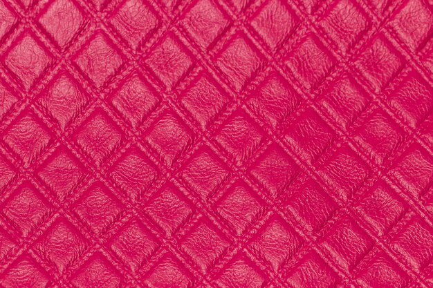 Pink leather and a textured background