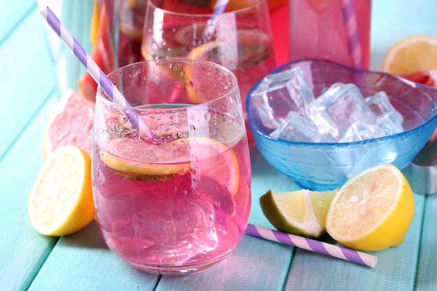 Pink lemonade in glasses on table closeup