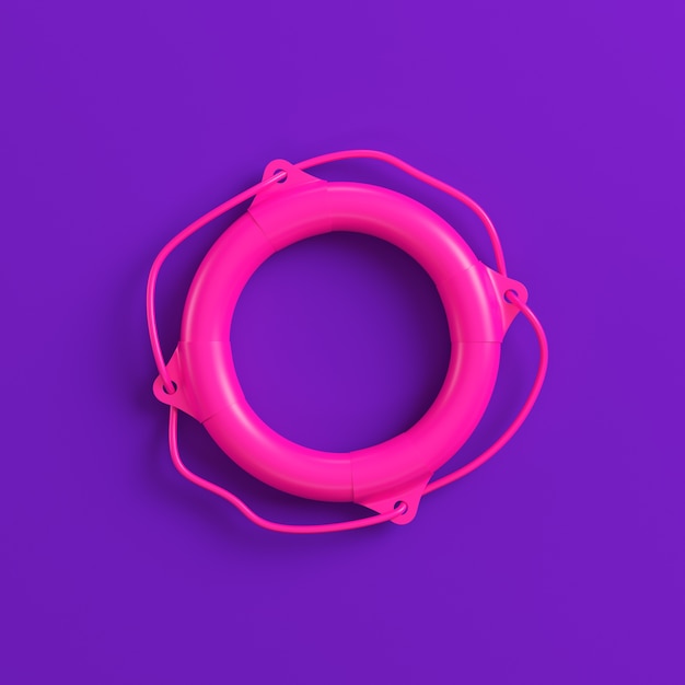 Photo pink lifebuoy on violet