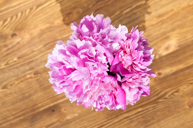 Pink light peonies flowers in a bouquet, photo close-up of flowers