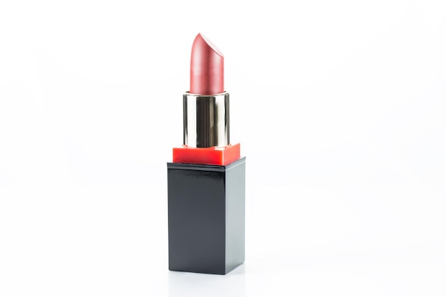 Pink lipstick isolated on white background