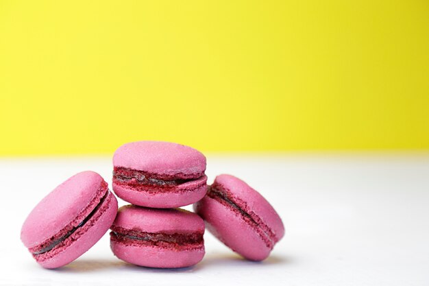 Pink macaroons on a white table