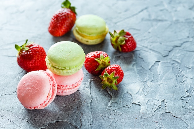 Pink macaroons with strawberries