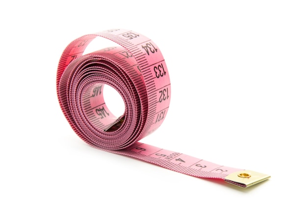 Premium Photo  Pink measuring tape isolated on white background