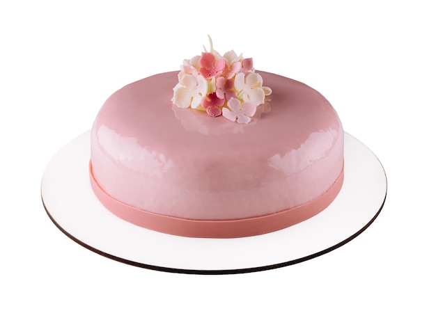 Pink mousse cakes decorated on white plate