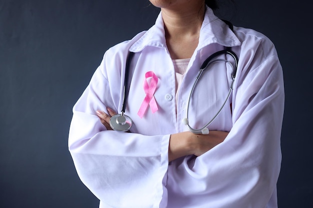 Pink October Breast Cancer Awareness month Supportive doctor wear pink ribbon