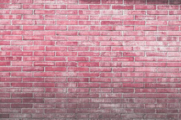 Pink old vintage brick wall backgroundDecorative brick wall surface for background