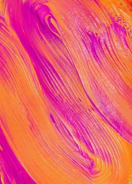 ピンクとオレンジの混沌とした混合ペイントの背景。最小限の抽象的なクリーミーな質感、メイクアップの創造的な壁紙のコンセプト