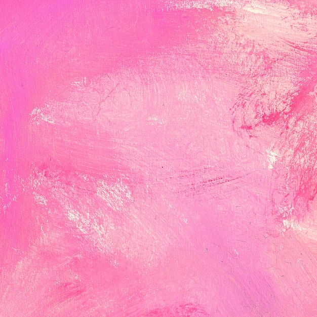 текстура розовой краски и свободные мазки на бумажном фоне