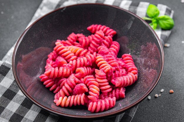 pink pasta beet sauce vegetable fusilli beetroo fresh food meal snack vegetarian food on the table