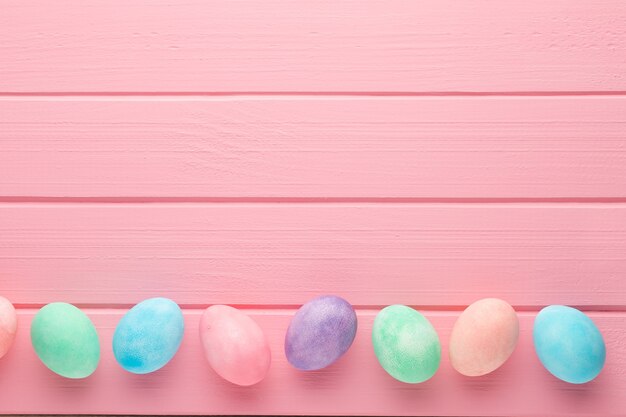 Pink pastel Easter eggs background. 