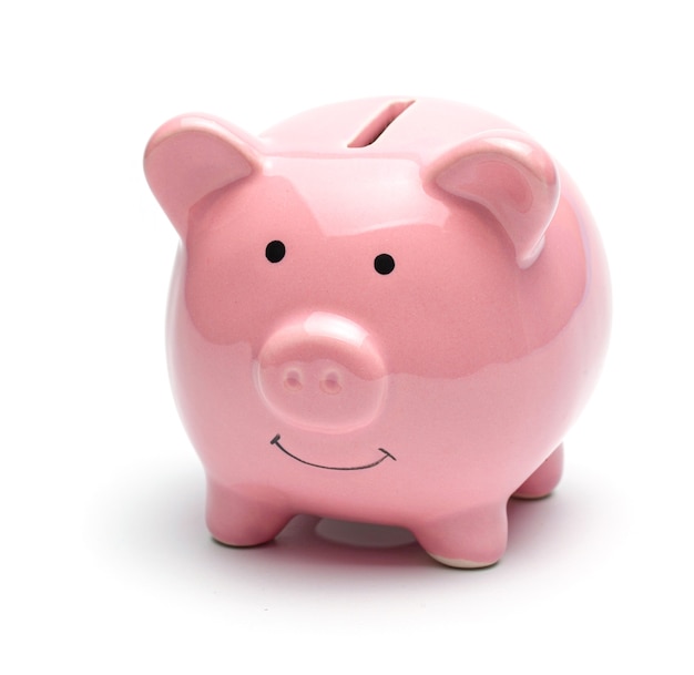 Pink piggy bank isolated on a white background.