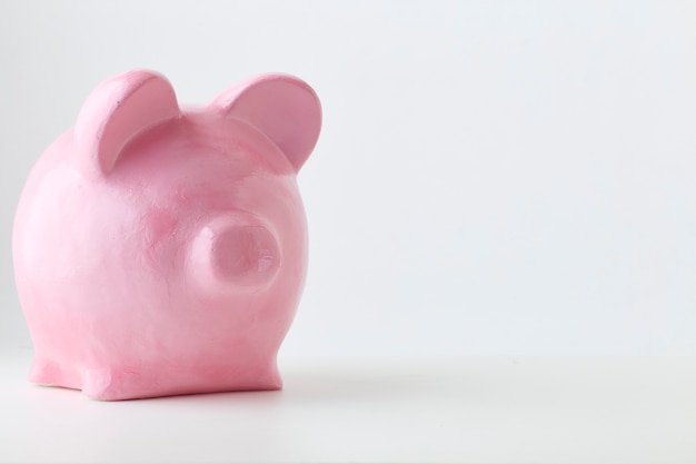 Pink Piggy Bank On White Background