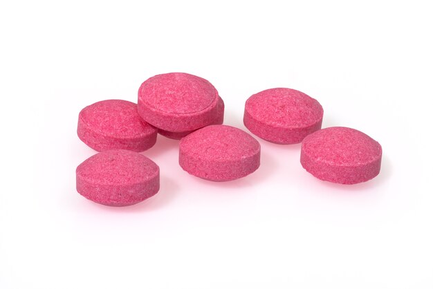 Photo pink pills closeup drug macro photography