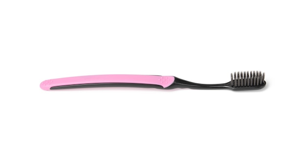 Pink plastic toothbrush isolated on white surface, close up