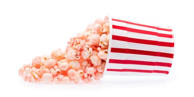 pink Popcorn in striped bucket isolated on white background