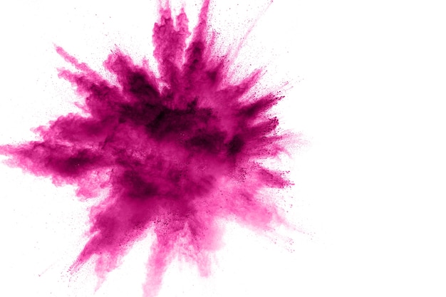 Pink powder explosion isolated on white background.