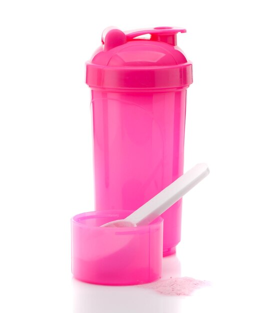 Фото Розовый протеиновый шейкер и протеин