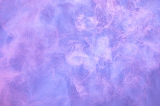 Pink and purple smoke on light blue background soft smoke texture