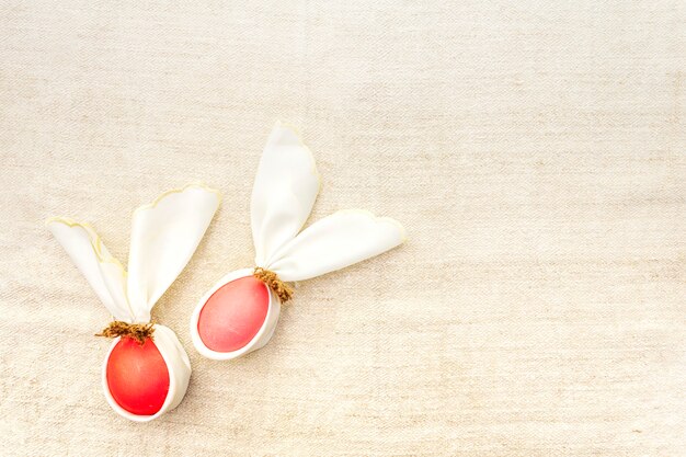 Pink and red eggs with bunny ears