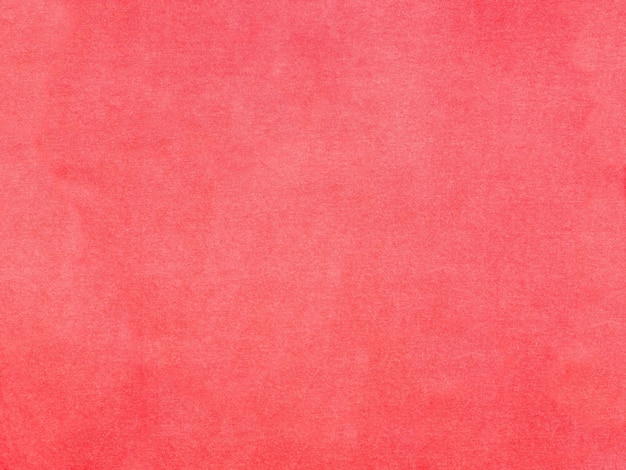 ピンクの赤い黄土色の抽象的な綿の横の生地のキャンバスの背景
