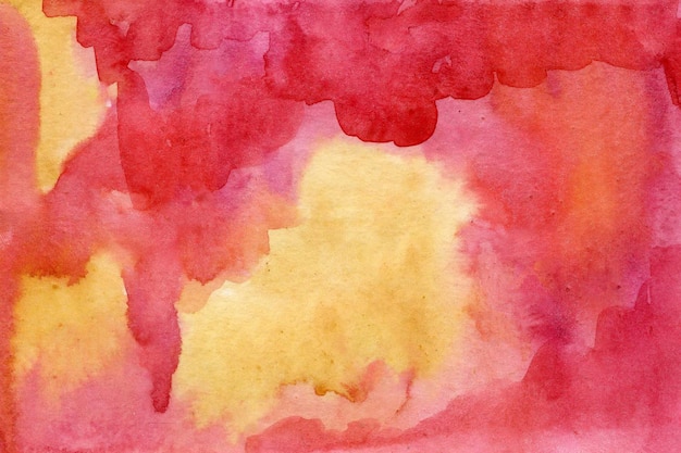 ピンク、赤、黄色の水彩紙の背景テクスチャ