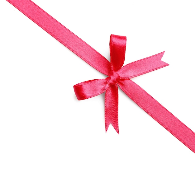 Pink ribbon bow on white background