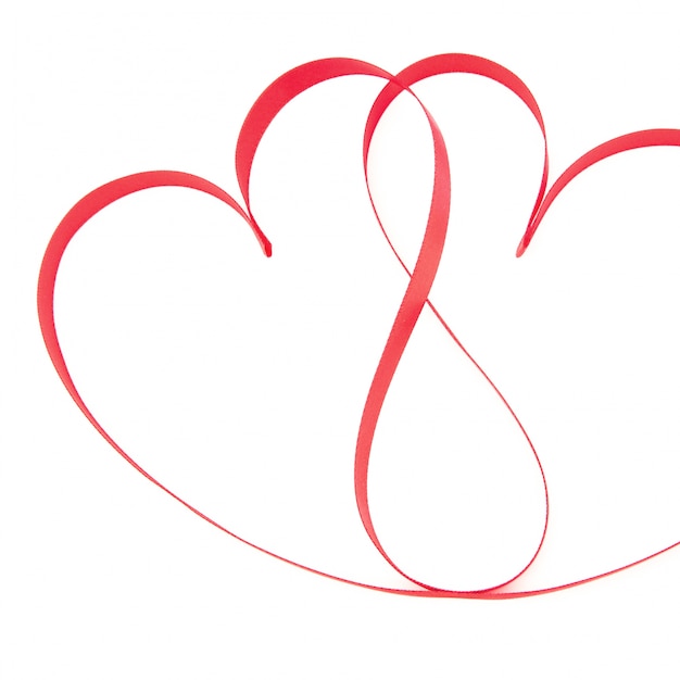 Photo pink ribbon in heart shapes