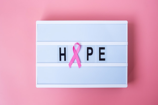 Pink Ribbon on lightbox with HOPE text 