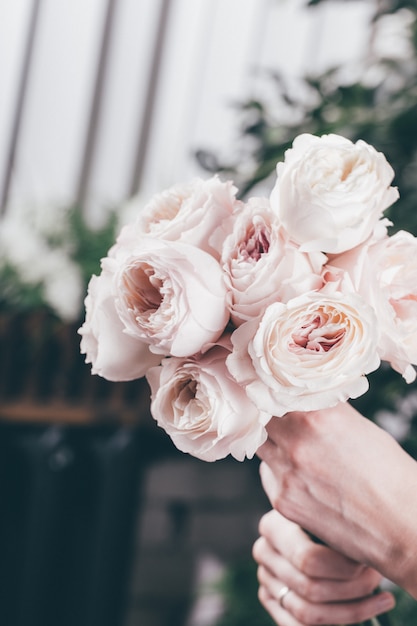 Pink rose in brides flower bouquet