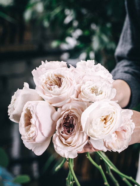 Pink roses in brides flower bouquet