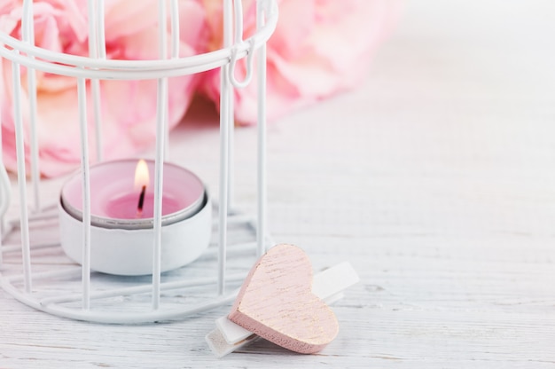 Pink roses, candle, heart