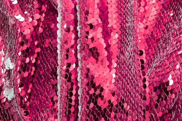 Pink shiny sequins fabric as a background