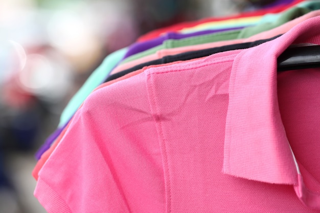 Pink shirt on a hanger.