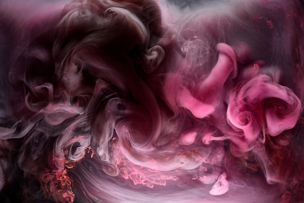 Pink smoke on black ink background, colorful fog, abstract swirling touch ocean sea, acrylic paint pigment underwater