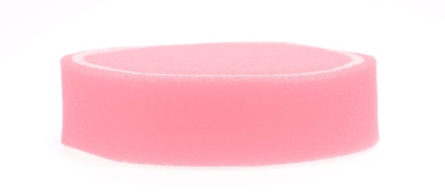 Pink sponge isolated on white background.