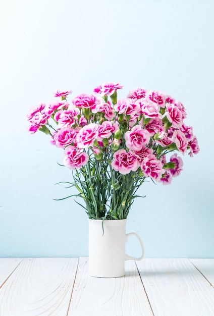 pink spring flower on wood background