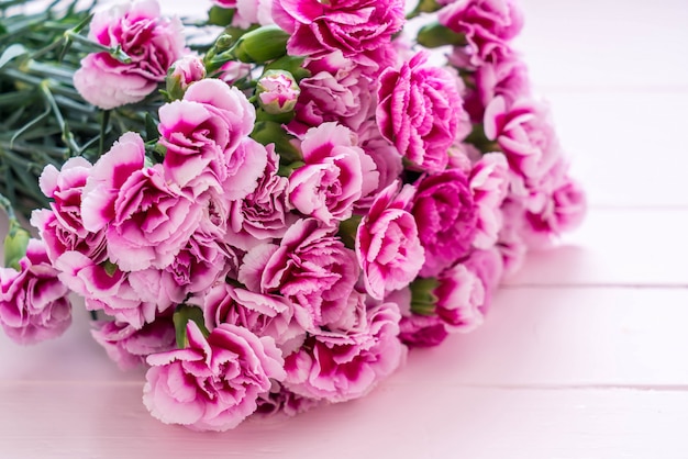 pink spring flower on wooden background