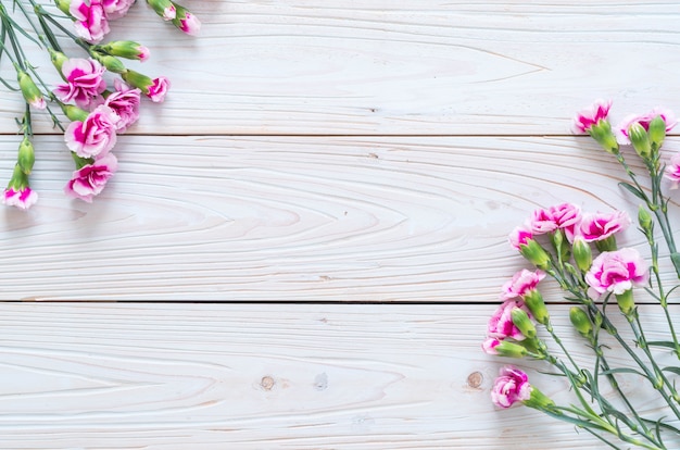 pink spring flower on wooden background