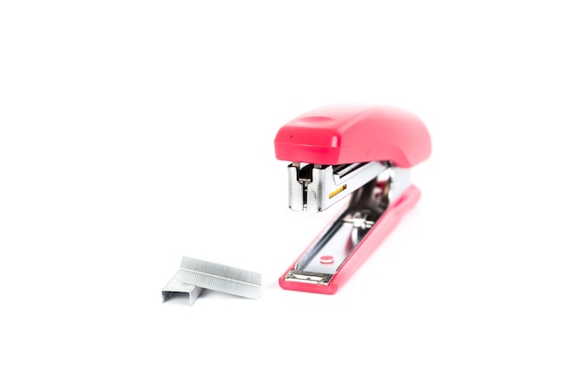 Photo pink stapler isolated on white background