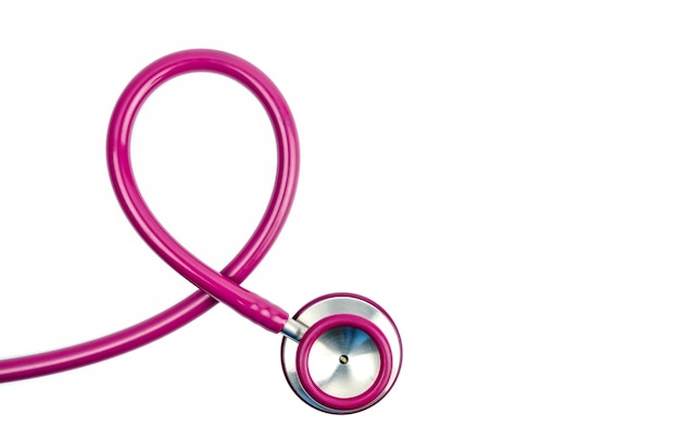 Photo pink stethoscope as breast cancer awareness symbol on white background