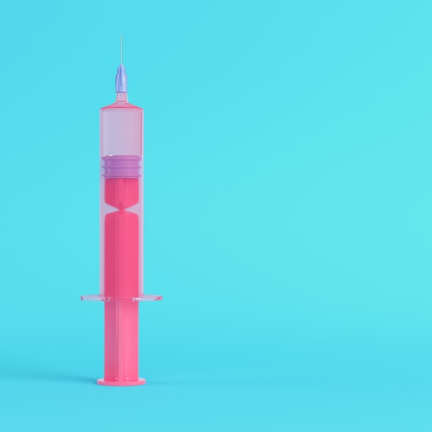 Pink syringe with vaccine on bright blue background in pastel colors. Minimalism concept. 3d render