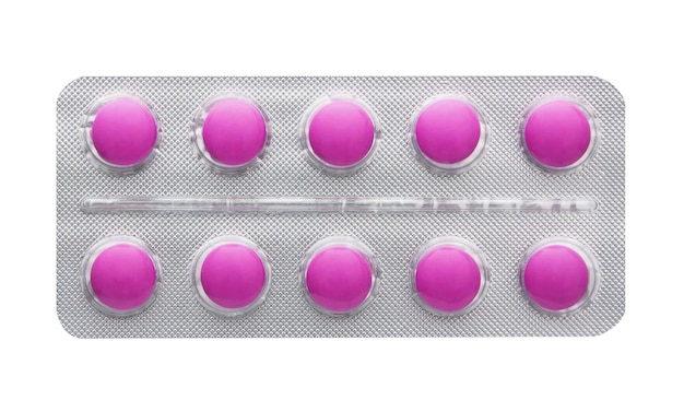 Pink tablet pills in blister isolated on white background