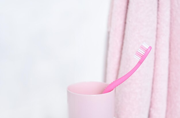 Pink teeth brush for everyday cleaning morning routine