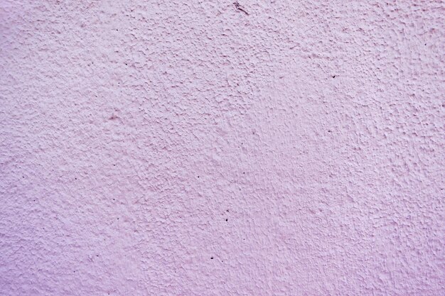 Pink Textured putty wall construction background